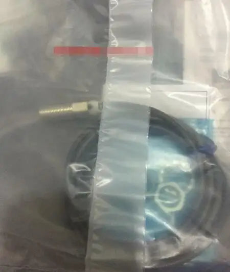 New in box OMRON E2EM-X4C1-W