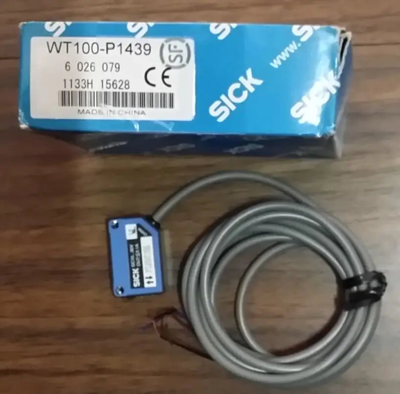 WT100-P1439 1pc NEW SICK PHOTOELECTRIC SENSOR