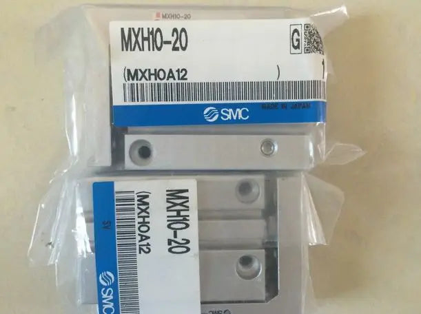 MXH10-20 MXH10 20 New in box SMC pneumatic slide free shipping